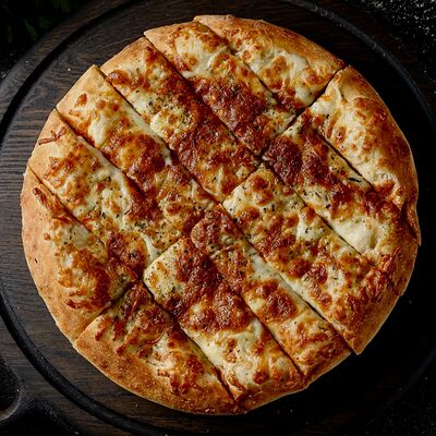 Сырные палочки с орегано (22 см) в Hot Pizza по цене 460 ₽