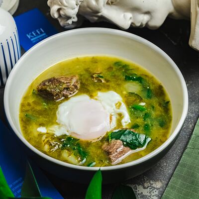 Креатосупа с щавелем и яйцом пашотв KEFI greek kitchen по цене 750 ₽