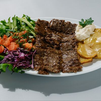 Порцион Дёнер с говядиной в Doner Kebab по цене 470 ₽