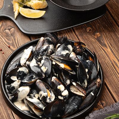 Мидии в сливочно-чесночном соусев Паб 357 по цене 2350 ₽