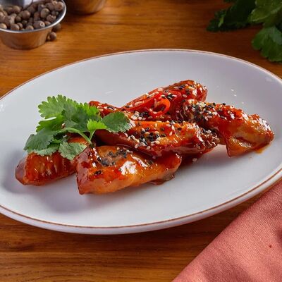 Куриные крылья в кисло-сладком соусе в BBQ Beer Restaurant по цене 815 ₽