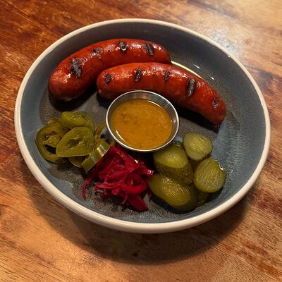 Пряные колбаски с сыром в John Gilroys по цене 1250 ₽