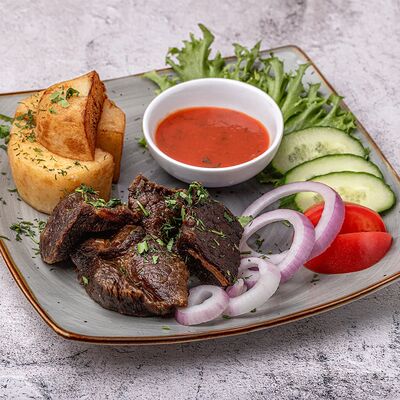 Казан-кебаб из говядины в Афрасиаб по цене 685 ₽