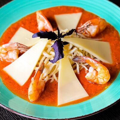 Дунганская лапша с креветками в Навруз по цене 690 ₽