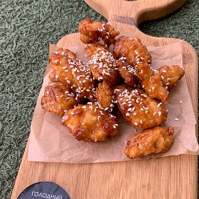 Куриный попкорн в соусе в Желтый фудтрак Голодный Дино по цене 390 ₽