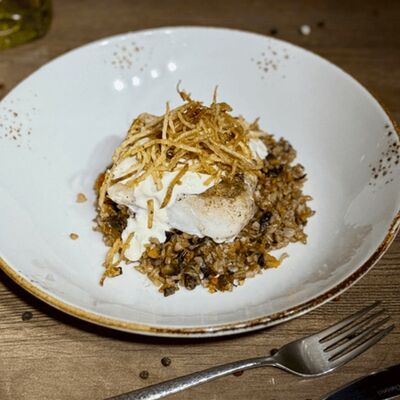 Судак жареный с томленой полбой в Ramada по цене 1400 ₽