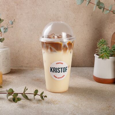 Персиковый айс латте в Kristof Coffee and Kitchen по цене 425 ₽