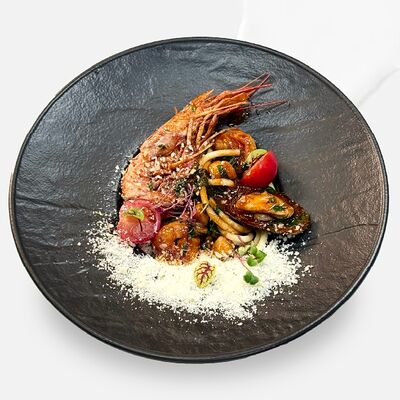 Спагетти Фрутти ди Маре с морепродуктами в Caviar по цене 980 ₽