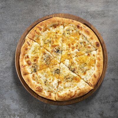 Пицца Четыре сыра в Урюк по цене 790 ₽