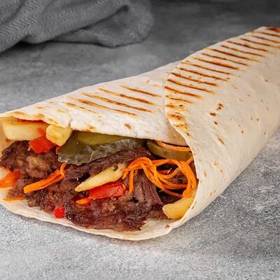 Тортилья говядина в КОМБИНАТ шаурма и стритфуд по цене 368 ₽
