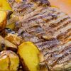 Стейк из свинины с печеным картофелем, грибами и сырно-мясным соусомв Устрицы & танцы по цене 980