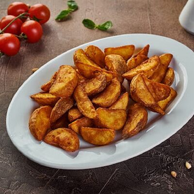 Картофельные дольки в Pizza Milano по цене 250 ₽