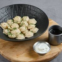 Пельмени с двумя видами мясав В угли