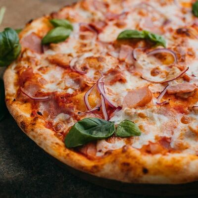 Пицца Мясная в Krutli по цене 737 ₽