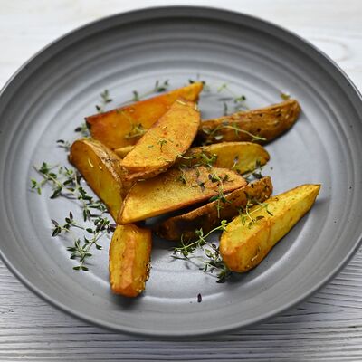Печеный картофель с розмарином в Bucho по цене 160 ₽