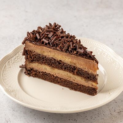Торт Шоколадно-банановый в Кофейня Пенка по цене 380 ₽