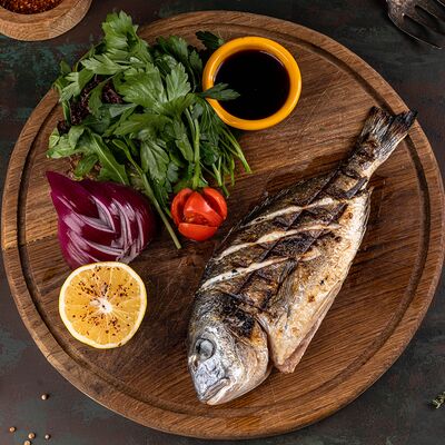 Дорадо на мангале в MARMARIS RESTAURANT по цене 1690 ₽