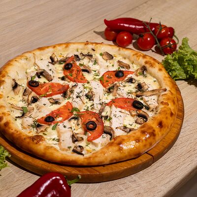 Пицца с курицей в Плюшка ватрушка по цене 650 ₽