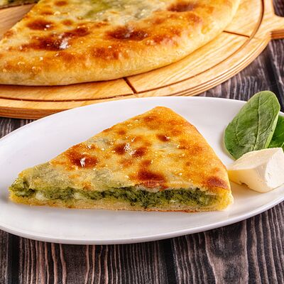 Пирог с сыром и шпинатомв Осетинские Пироги по цене 1250 ₽