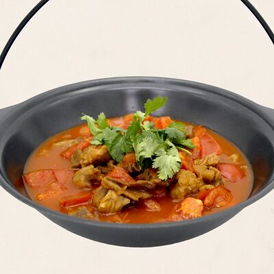 Нежная тушеная говядина с розовыми томатами в Золотая панда по цене 2207 ₽