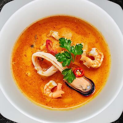 Суп Том ям по-тайски в СЫТЫЙ БЫК по цене 650 ₽