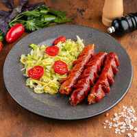 Тарелка колбасок гриль с салатом в Loft pub