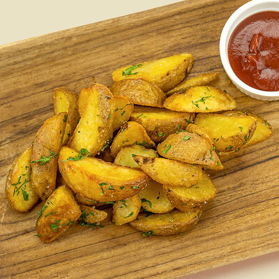 Картофель по-деревенски в Додома по цене 355 ₽