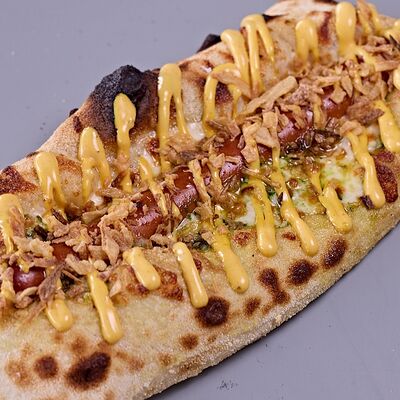 Пицца-дог Песто в Кафе Итальянцы по цене 510 ₽