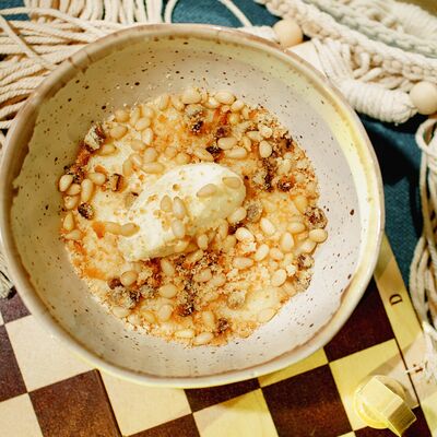 Гурьевская каша с кедровыми орехами в Mola Mola по цене 550 ₽