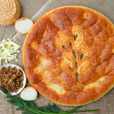 Пирог с мясом и капустой в Пироги по-коми по цене 1349 ₽