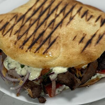 Шаурма с говядиной в лепёшкев Кафе нут по цене 525 ₽