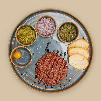 Тартар из говядины в Любим сытно по цене 1145 ₽