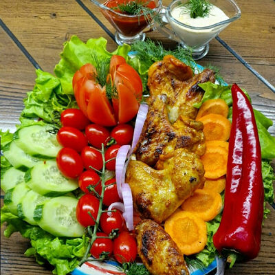 Куриные крылышки в Мангал №1 по цене 550 ₽