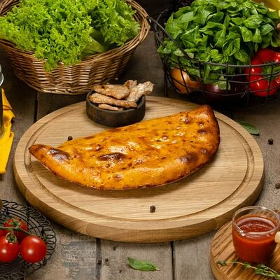 Кальцоне кура в тесте 🍕 в Max & Pizza по цене 550 ₽