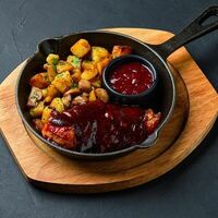 Вырезка из свинины с клюквенным соусом в Mesto Sushi & Grill