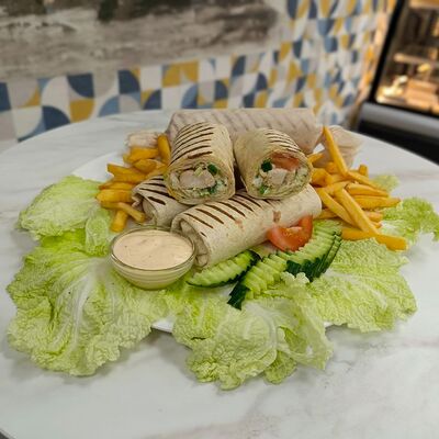 Тортилья с курицей в EDA Habibi по цене 250 ₽