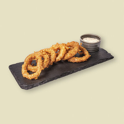 Луковые кольца с чесночным соусом в Додома по цене 450 ₽