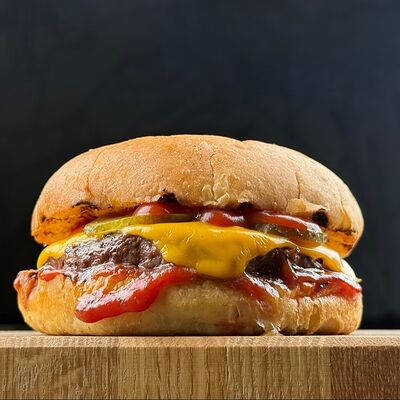 Чизбургерв По Чесноку по цене 688 ₽