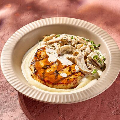 Котлета из курицы с картофельным кремом и грибным соусом в KITCHEN по цене 540 ₽