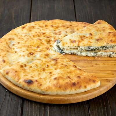 Пирог с сыром и зеленью в Осетинские пироги Вкусно Пироги по цене 1000