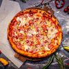 Пицца Охотничья в La Pizza Bomba на дровах по цене 750