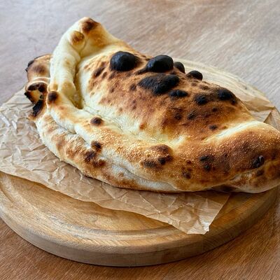 Пицца Кальцоне закрытая пицца в Импасто по цене 760 ₽