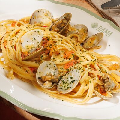 Лингвини с вонголе и морским ежом в TiAMA по цене 1300 ₽