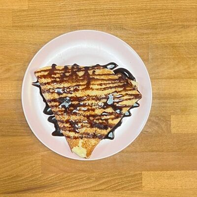 Блин с бананом ишоколадом в Фудкорнер по цене 340 ₽