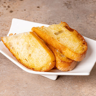 Чиабатта с чесноком, поджареная на сливочном масле в Lili по цене 300 ₽