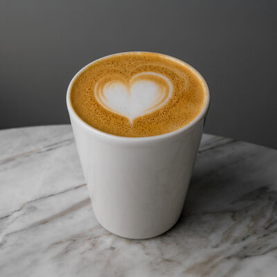 Капучино большое в Bisou Bisou Bistro по цене 495 ₽