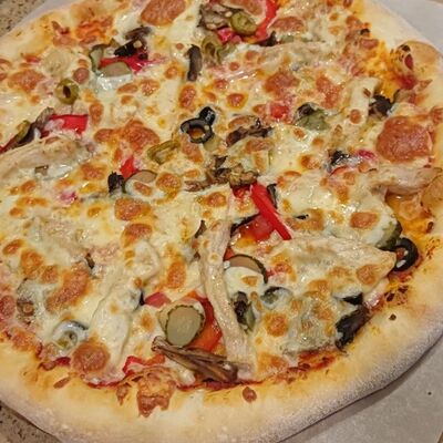 Пицца фирменная Фрайдей в Friday по цене 860 ₽