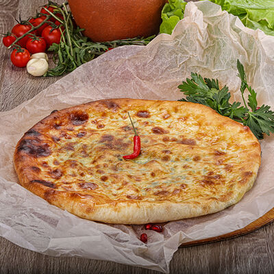 Осетинский пирог Сыр-шпинат в Грузинский дворик по цене 750 ₽