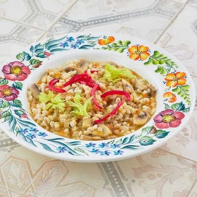 Перловая каша с шампиньонами и кореньями в Катюша Katyusha по цене 290