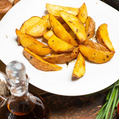 Картофель по-деревенски в Мегаролл по цене 300 ₽